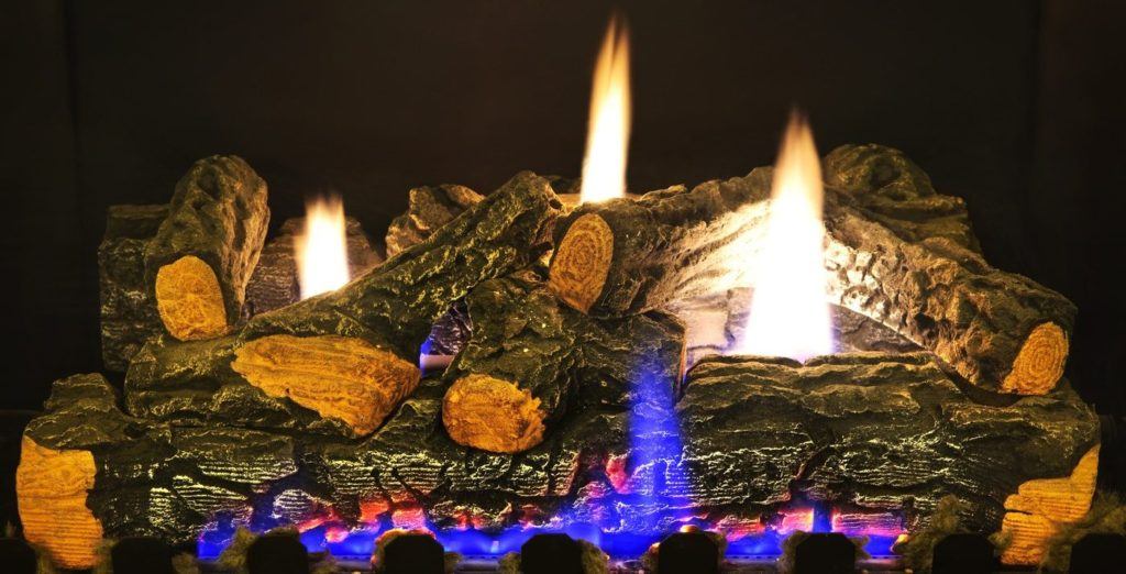 Close up of logs in gas fireplace