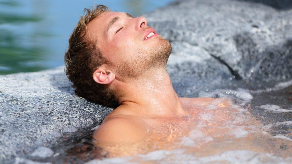 Wellness Spa - man relaxing in hot tub