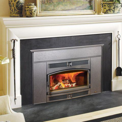 cape cod fireplace insert in elegant mantle