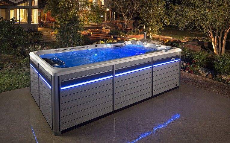 Endless Pools Swim Spa lit up at night