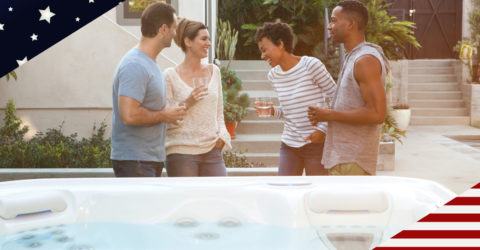 Labor Day Sale banner featuring two couples talking and laughing beside hot tub
