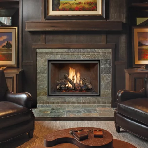 864 TV 40K Clean Face Deluxe Fireplace with Adjustable Tile Trim Kit, Old World Stucco fireback, and Classic Oak log set.