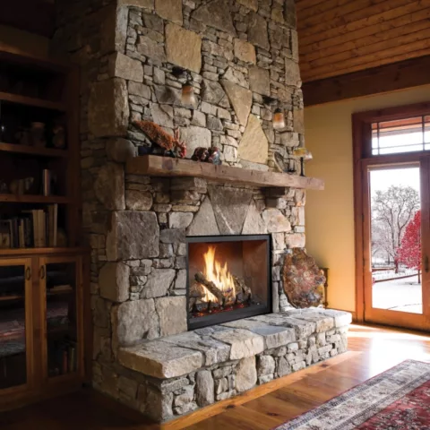 864 TV 40K Clean Face Deluxe Fireplace with Old World Stucco fireback, and Classic Oak log set.