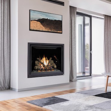 ProBuilder™ 42 Clean Face fireplace insert in a modern white living room