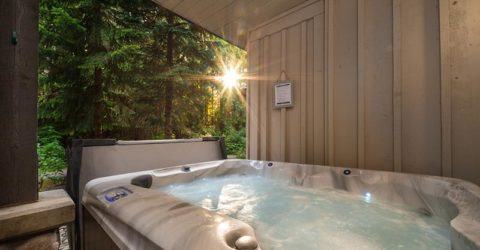 Outdoor hot tub with gorgeous view of redwood trees