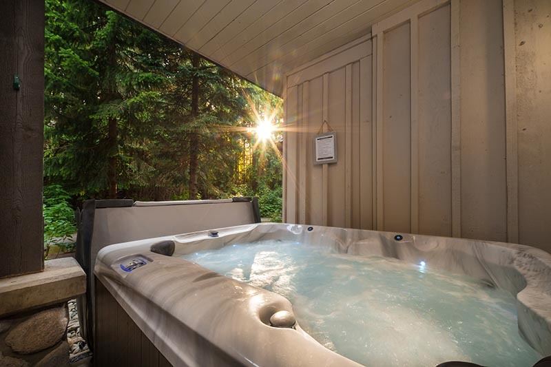 Outdoor hot tub with gorgeous view of redwood trees