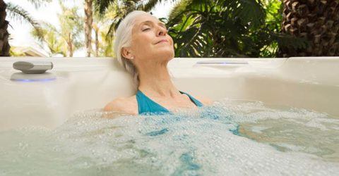women relaxing in a hot tub