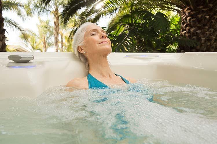 women relaxing in a hot tub