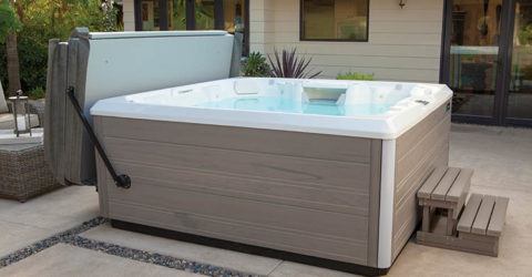 brand new hot tub installed in backyard