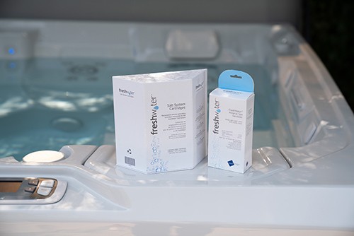 FreshWater hot tub sanitation filters in boxes on ledge of spa