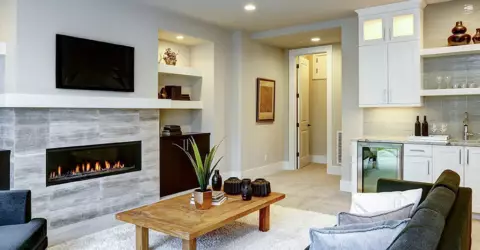 living room with modern look and fireplace insert