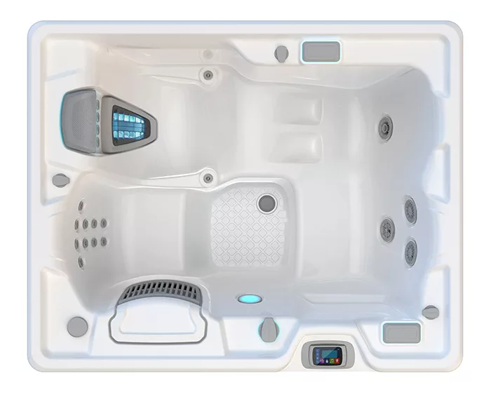 Overhead view of the shell of a Hot Spring Jetsetter hot tub with a white shell. 