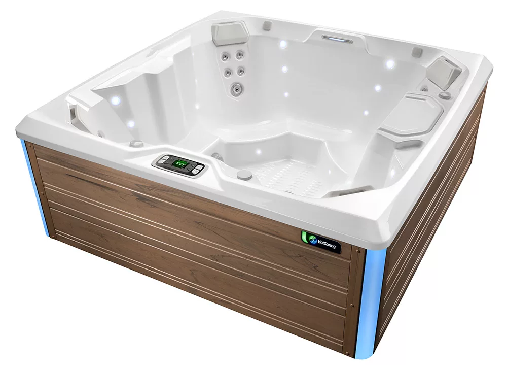 A Hot Springs Limelight Beam that seats four, with white shell.