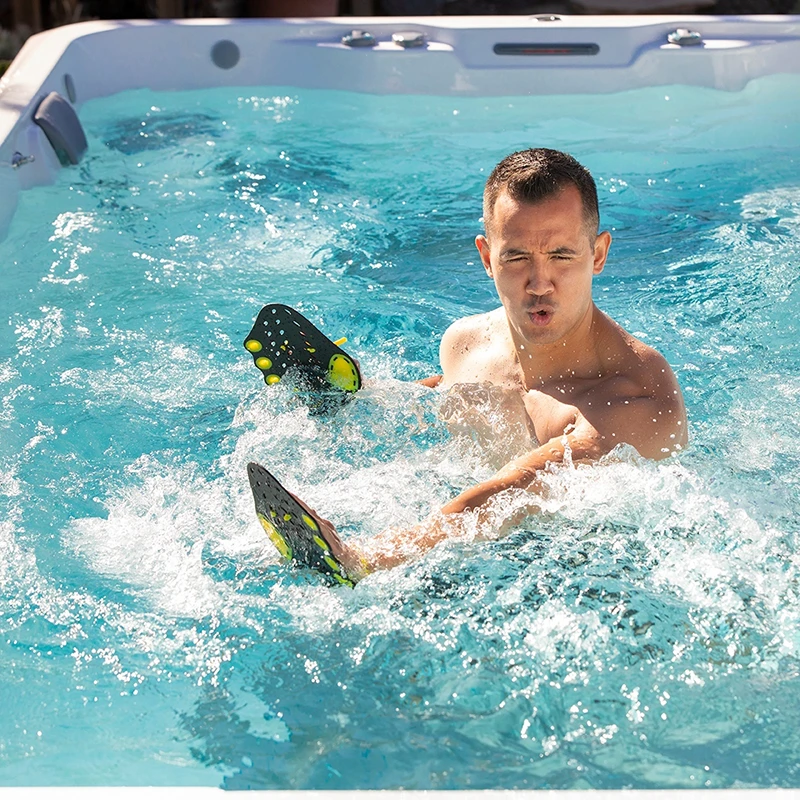 Man exercising in a swim spa