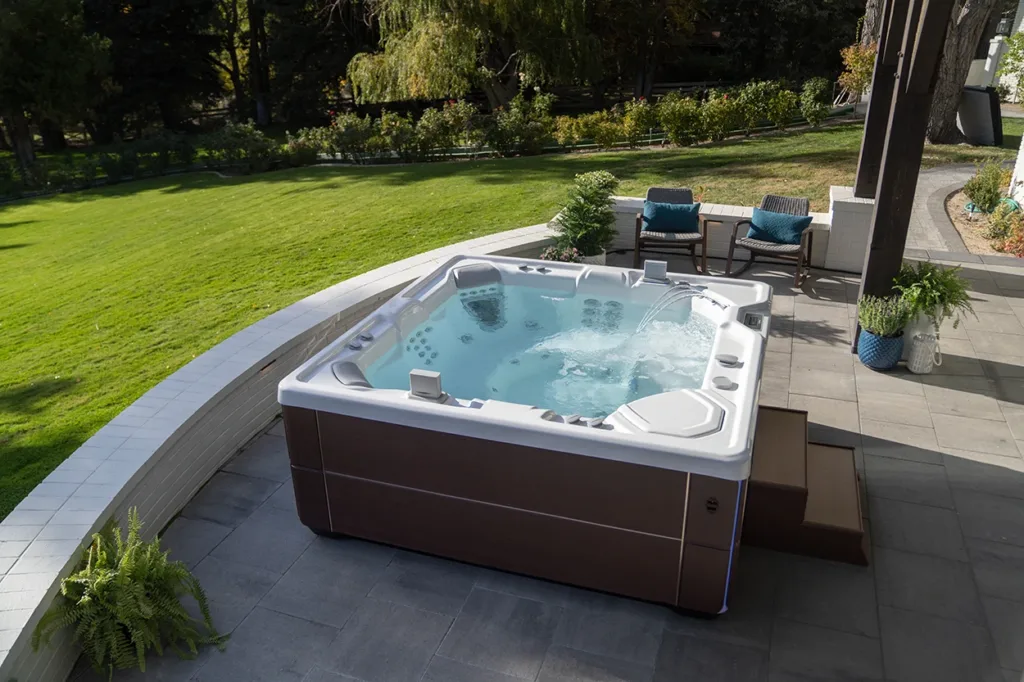 Hot Springs Highlife Collection - Vanguard Hot Tub 2024 - Water Clarifier vs Shock Treatment Guide